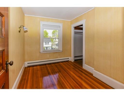 80 Barrows Street Dedham, MA 02026 - Photo 13 of 28 a view of an empty room with a window and wooden floor