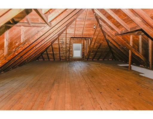 80 Barrows Street Dedham, MA 02026 - Photo 20 of 28 a view of an empty room with wooden floor