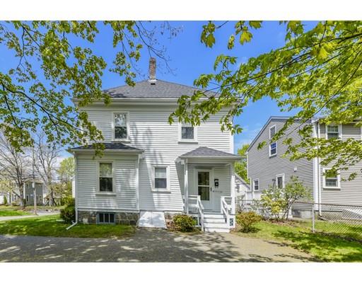 80 Barrows Street Dedham, MA 02026 - Photo 22 of 28 a view of a white house with a big yard and potted plants