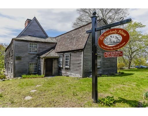 80 Barrows Street Dedham, MA 02026 - Photo 27 of 28 a front view of a house with garden