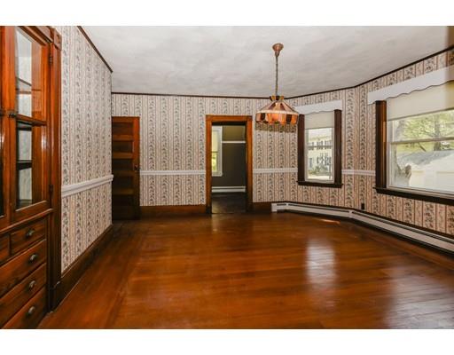 80 Barrows Street Dedham, MA 02026 - Photo 7 of 28 a view of a living room with hardwood floor and windows