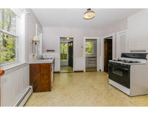 80 Barrows Street Dedham, MA 02026 - Photo 10 of 28 a kitchen with a stove a sink and a refrigerator