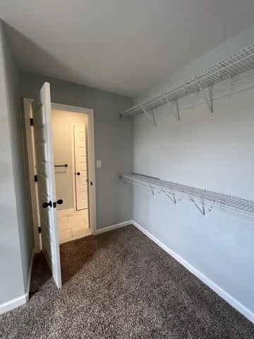 a view of balcony with wooden floor