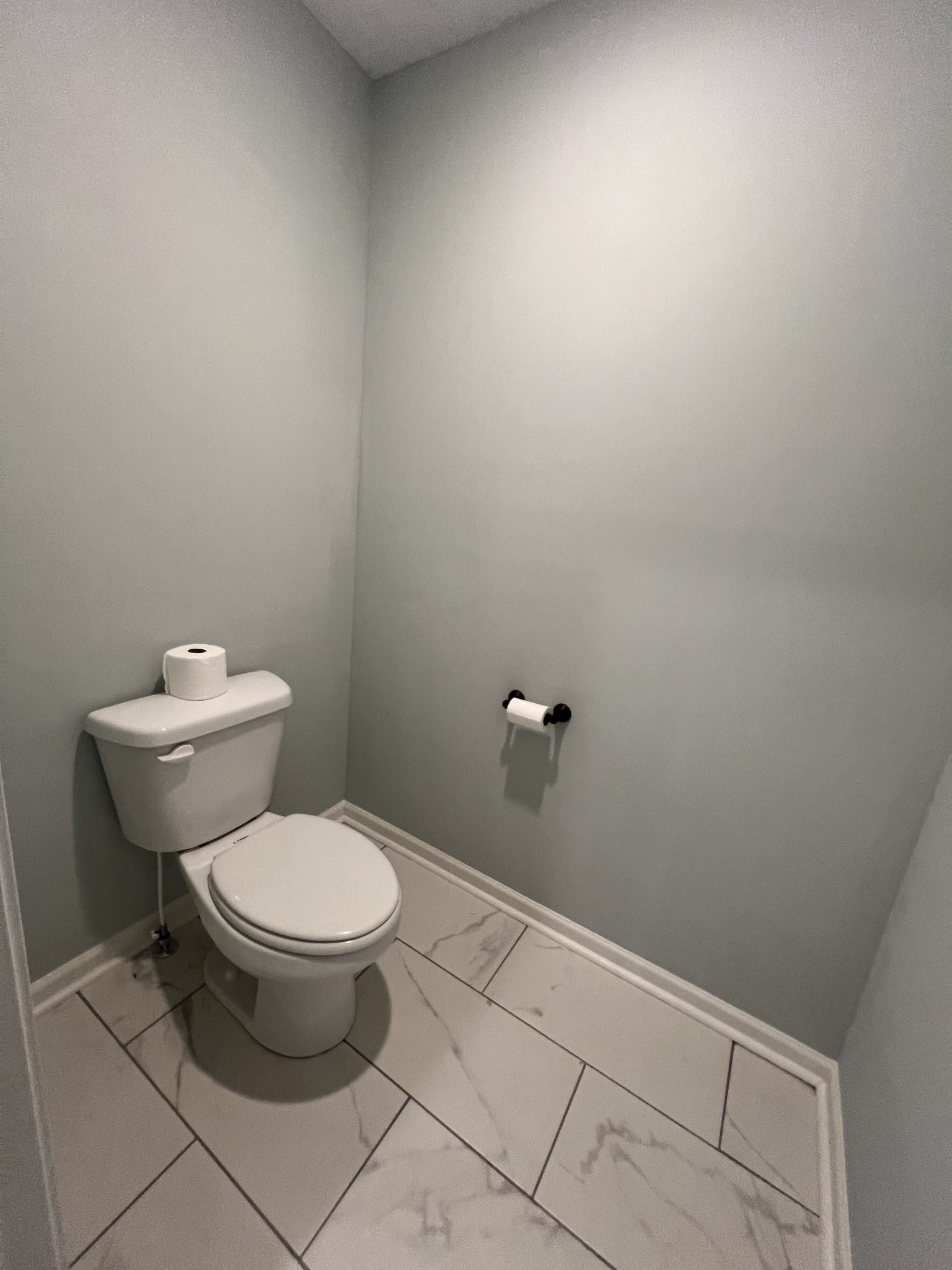 660 Elm Street Clarksville, TN 37040 - Photo 33 of 34 a white toilet sitting next to a white sink