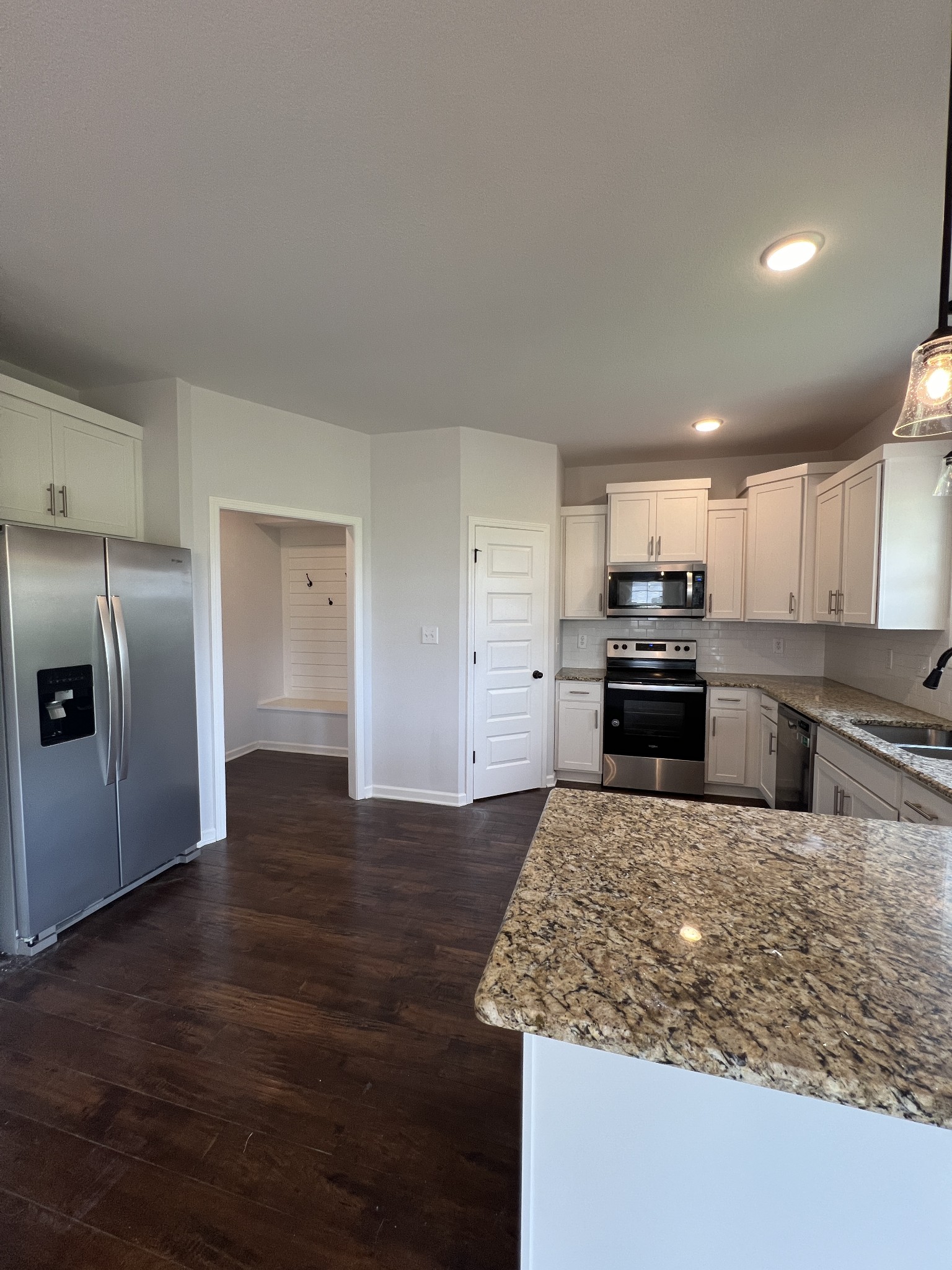 660 Elm Street Clarksville, TN 37040 - Photo 8 of 34 a kitchen with stainless steel appliances granite countertop a sink a stove and a refrigerator