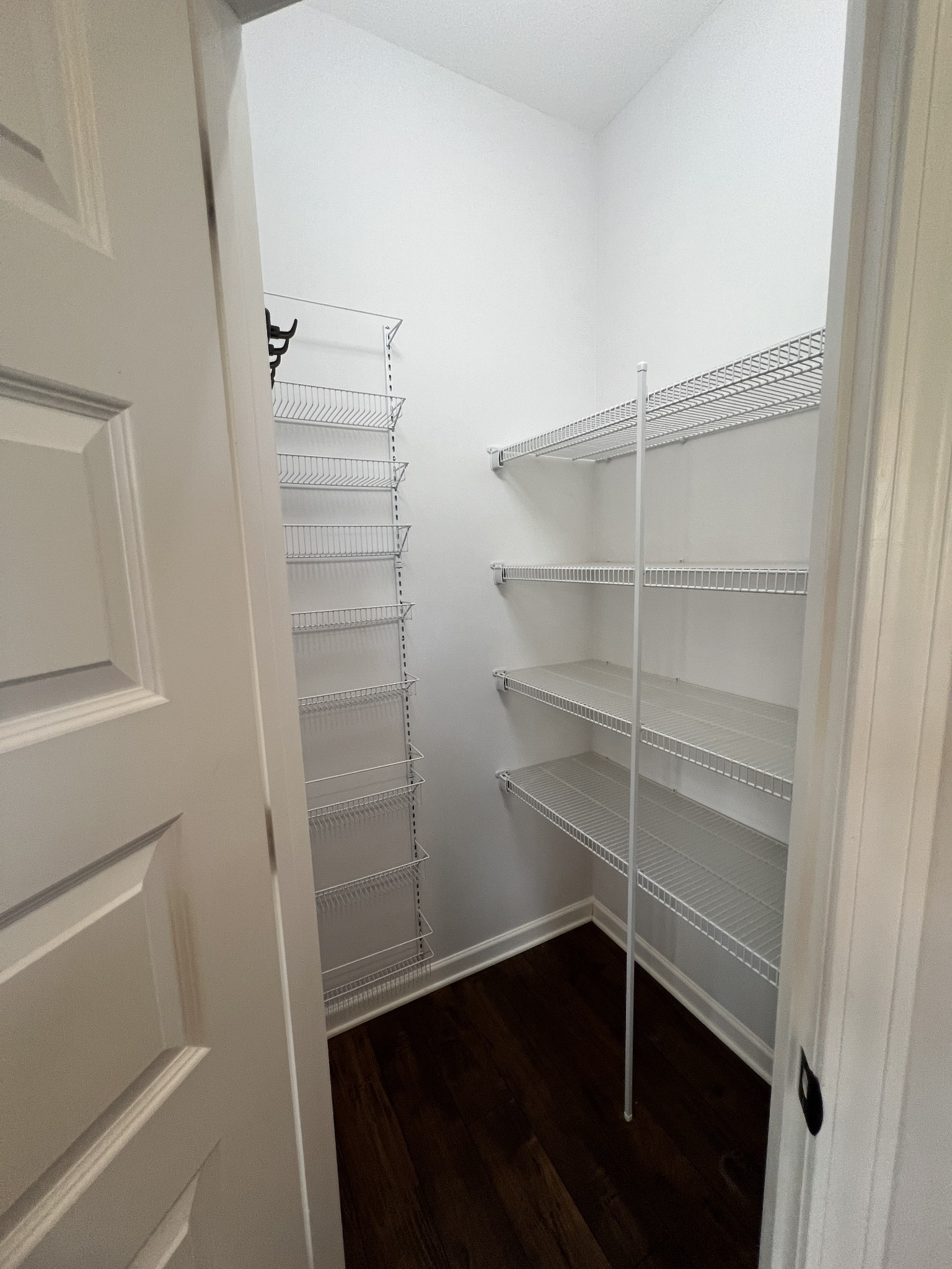 660 Elm Street Clarksville, TN 37040 - Photo 9 of 34 a view of walk in closet with empty racks