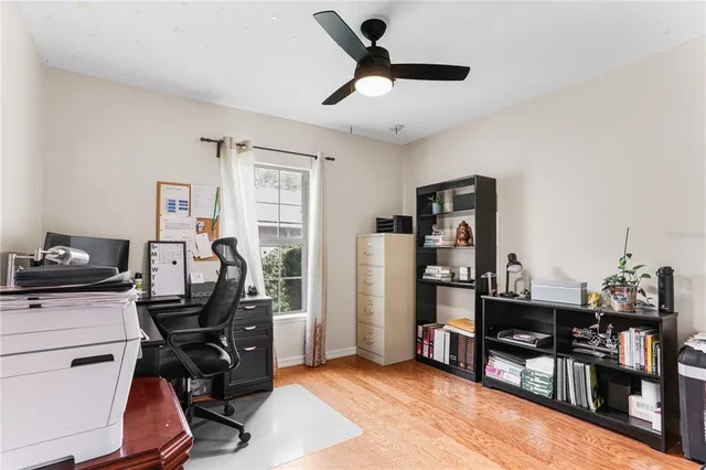 a view of a workspace with furniture