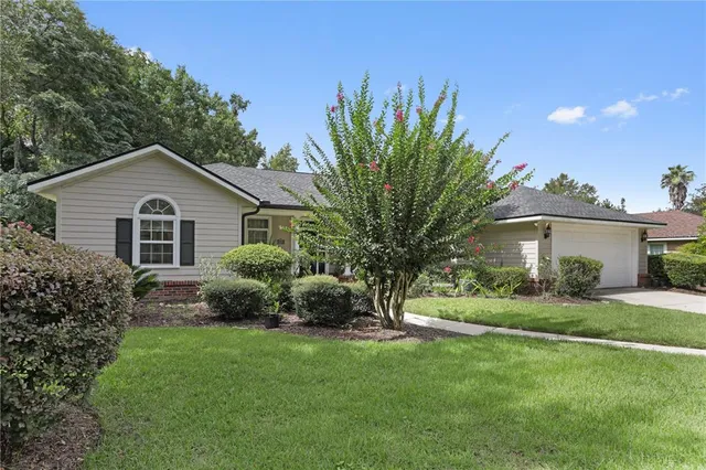 a house view with a garden space