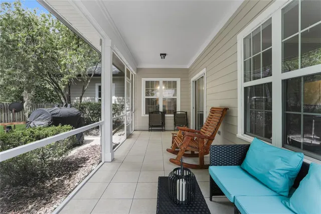 a view of two chairs in the balcony