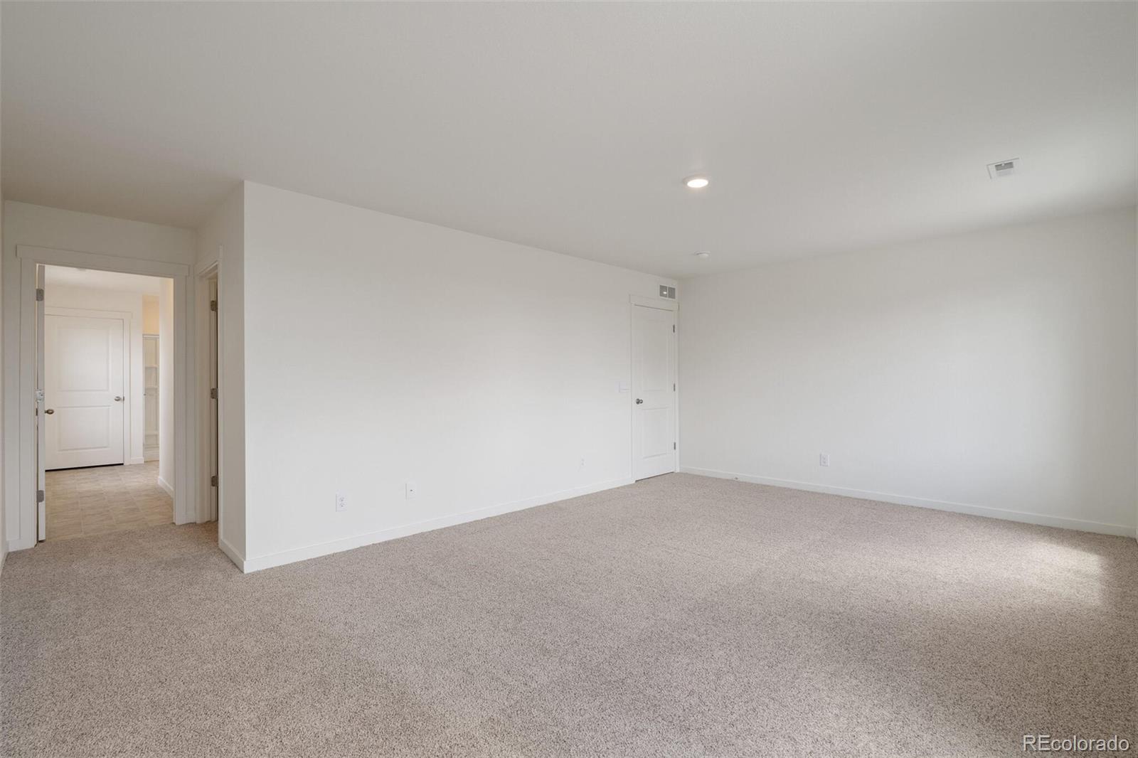 219 Haymaker Lane Severance, CO 80550 - Photo 21 of 44 a view of empty room