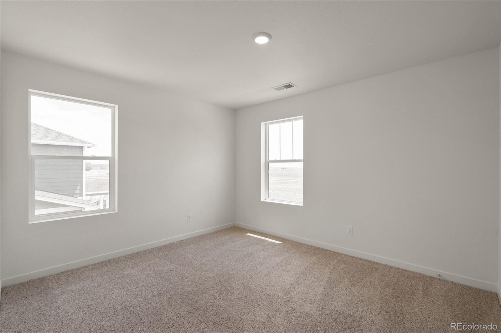 219 Haymaker Lane Severance, CO 80550 - Photo 25 of 44 an empty room with a window