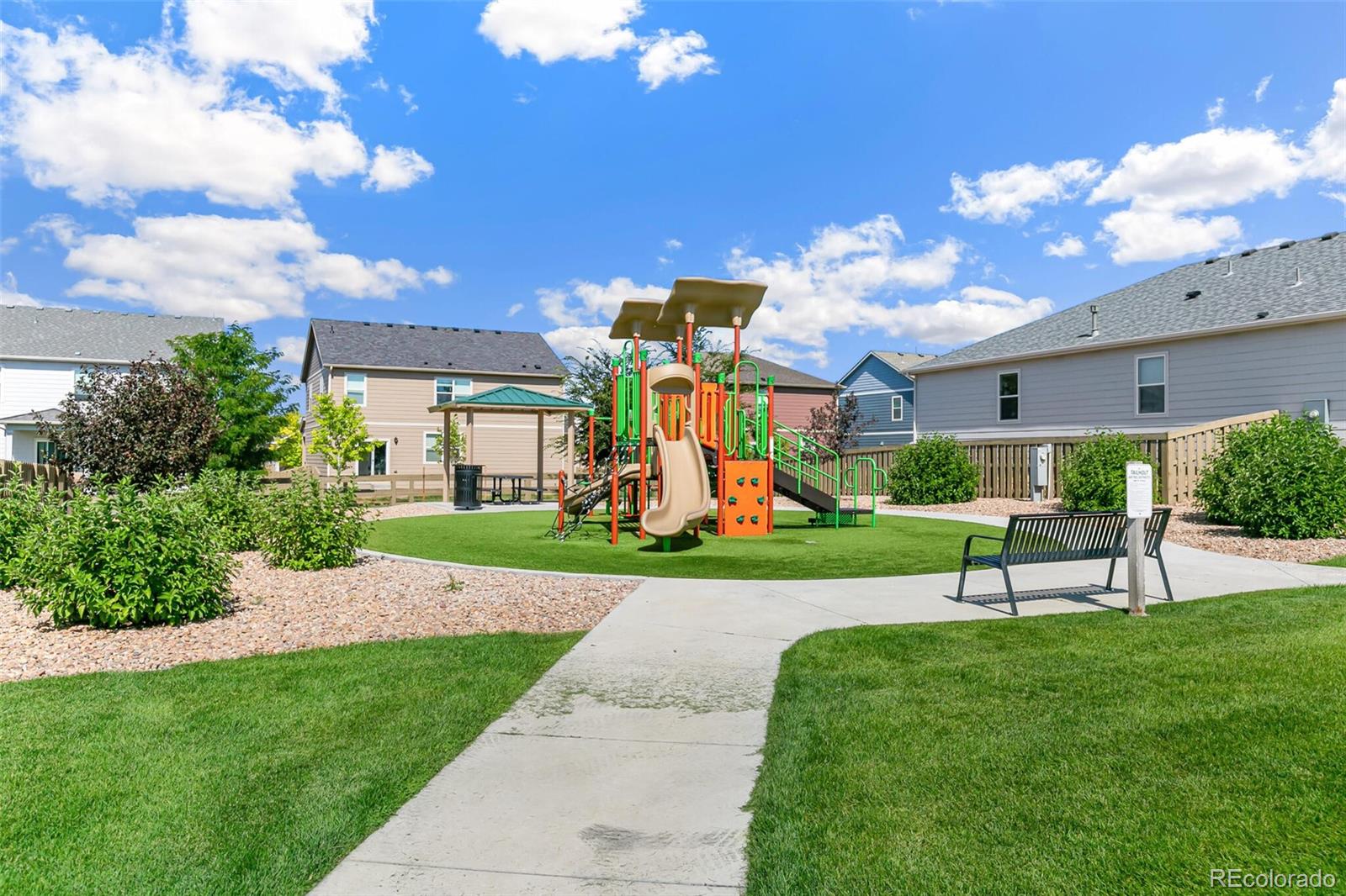 219 Haymaker Lane Severance, CO 80550 - Photo 39 of 44 a view of a chair and table in the garden