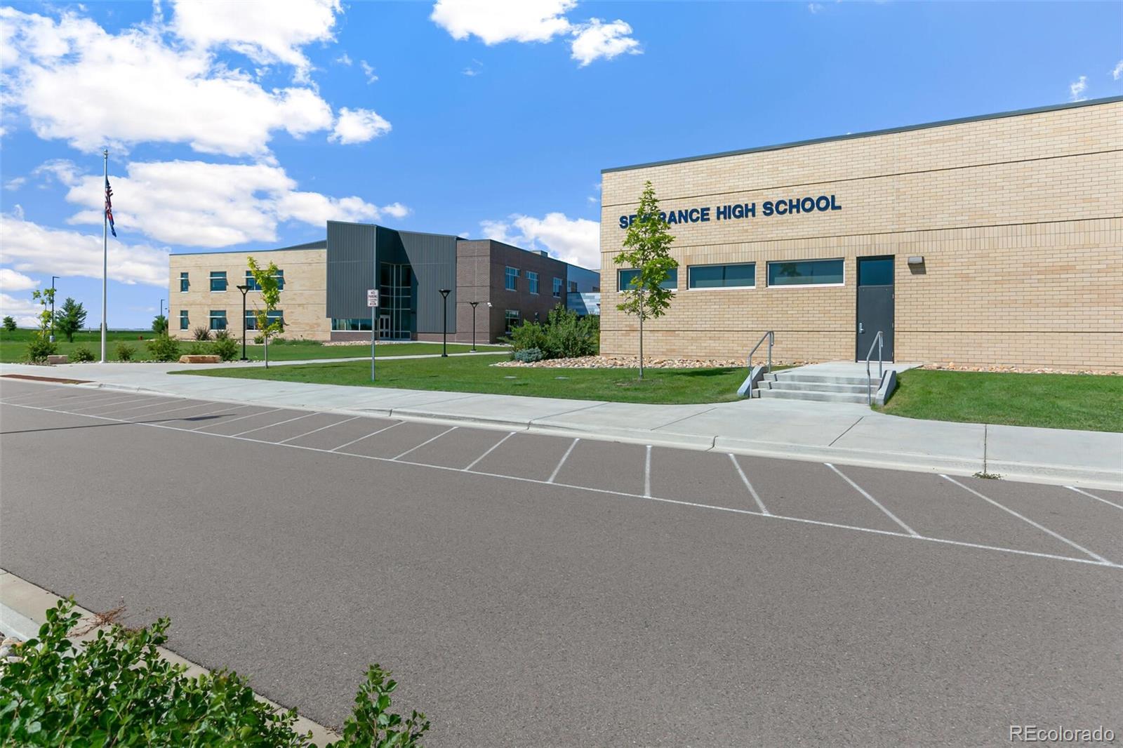 219 Haymaker Lane Severance, CO 80550 - Photo 42 of 44 a view of a building with a street