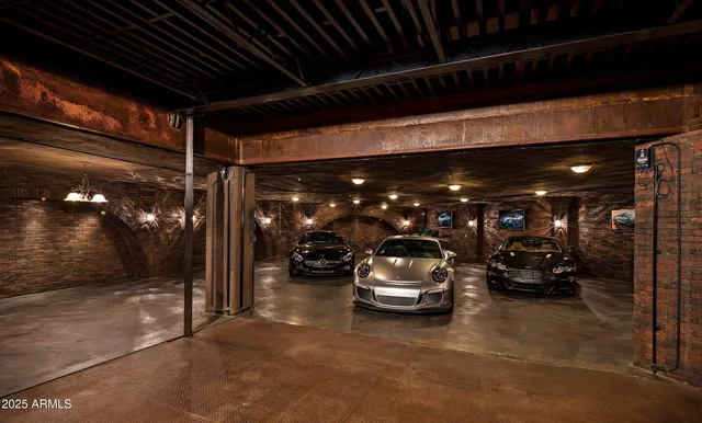 a media room with furniture and a projector screen