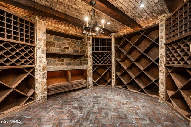 a bedroom with a bed and a chair