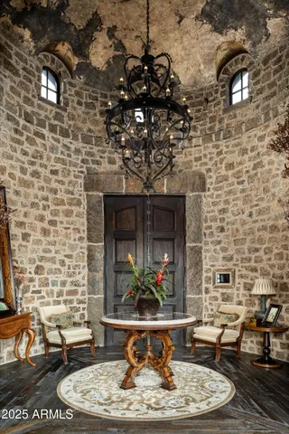 a kitchen with stainless steel appliances granite countertop a stove and cabinets