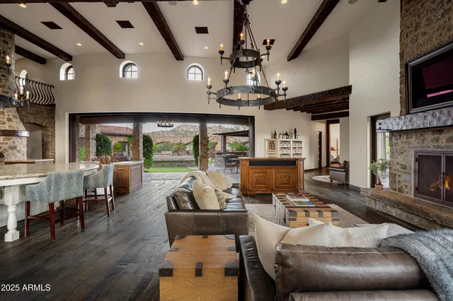 a view of a kitchen with a table and chairs