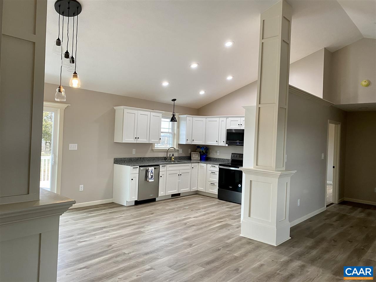 907 New Hope Road Staunton, VA 24401 - Photo 11 of 50 a kitchen with a refrigerator and a stove top oven