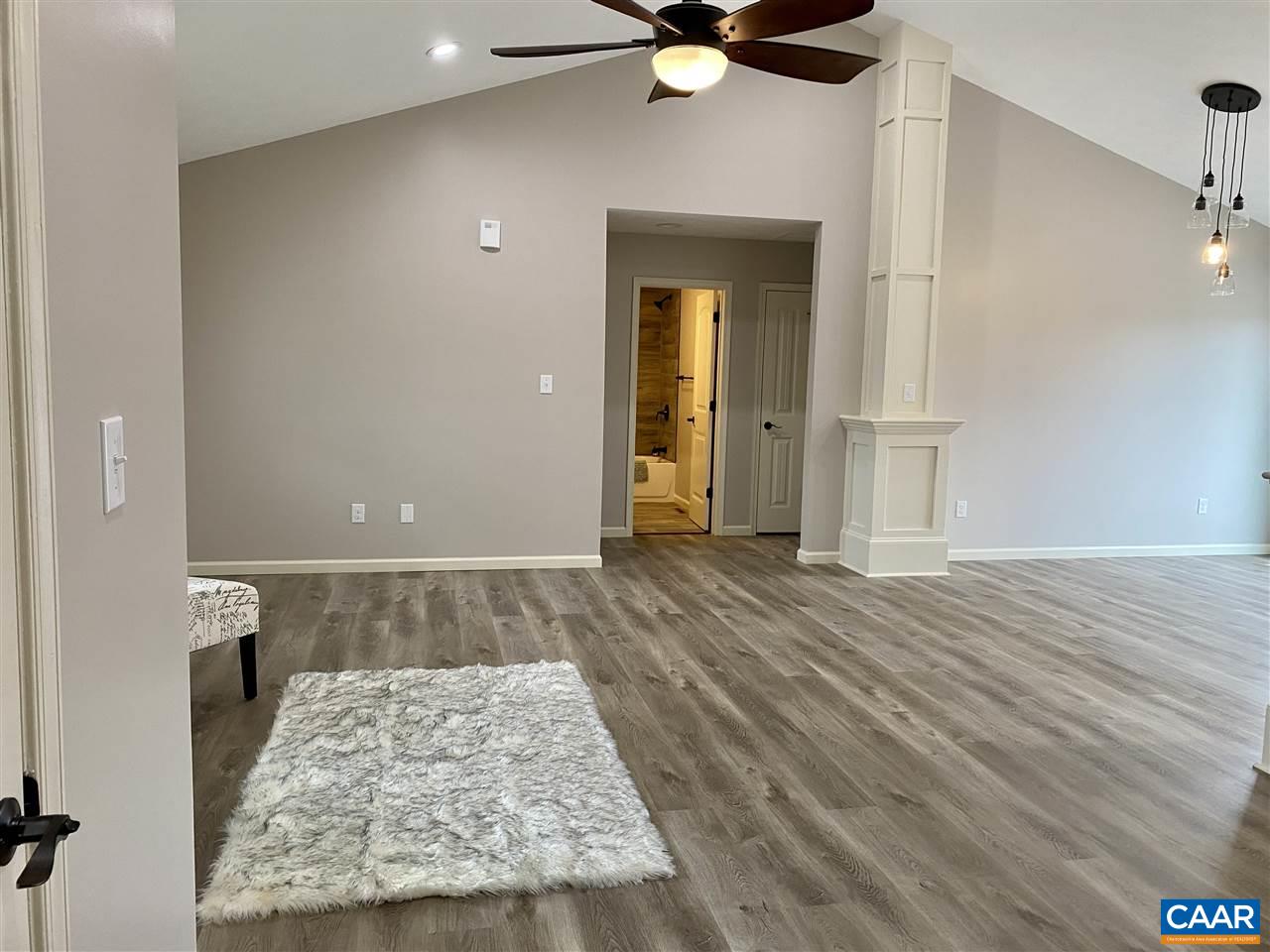 907 New Hope Road Staunton, VA 24401 - Photo 24 of 50 wooden floor in an empty room with a mirror