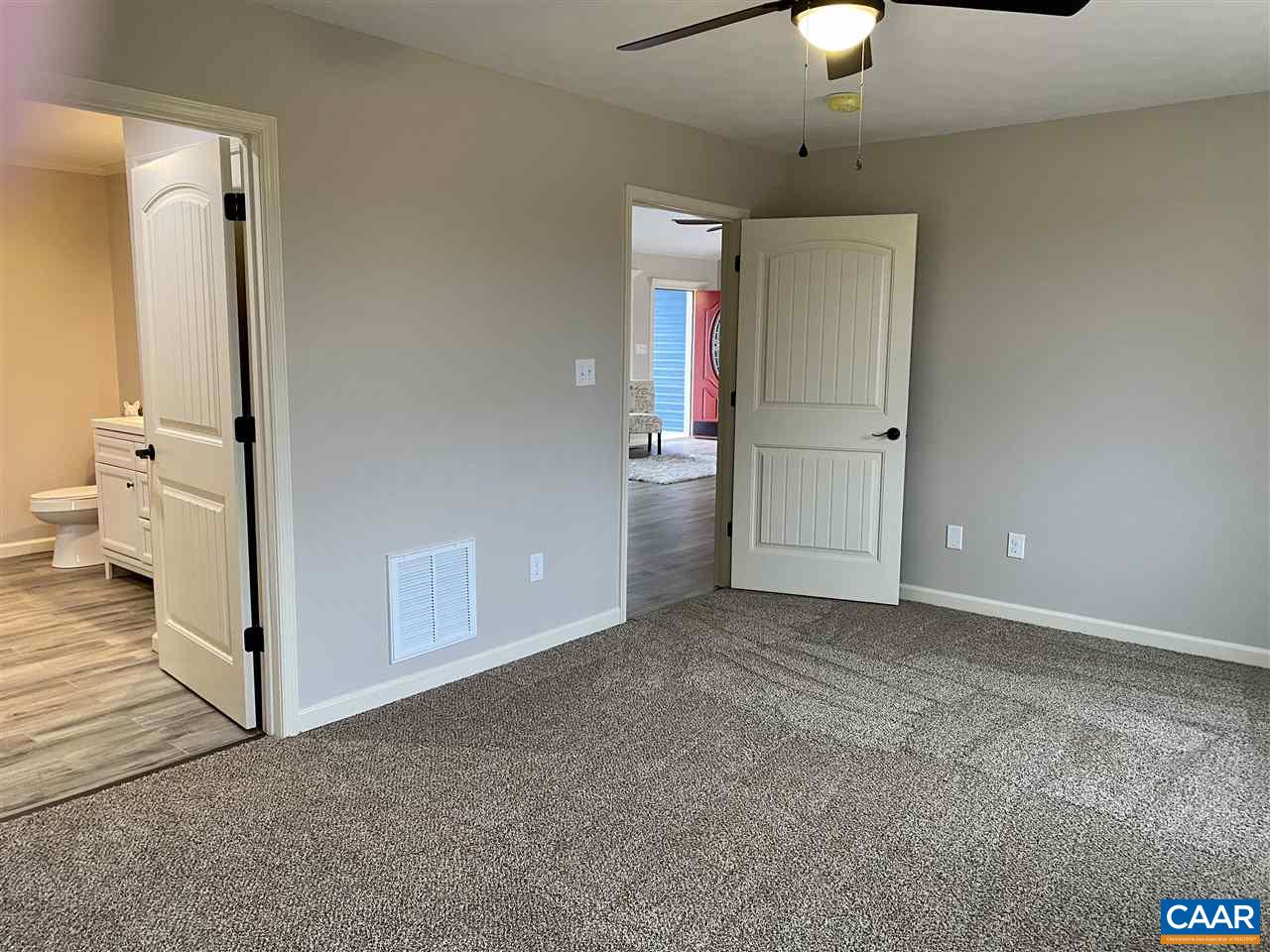 907 New Hope Road Staunton, VA 24401 - Photo 27 of 50 wooden floor in an empty room and a bathroom