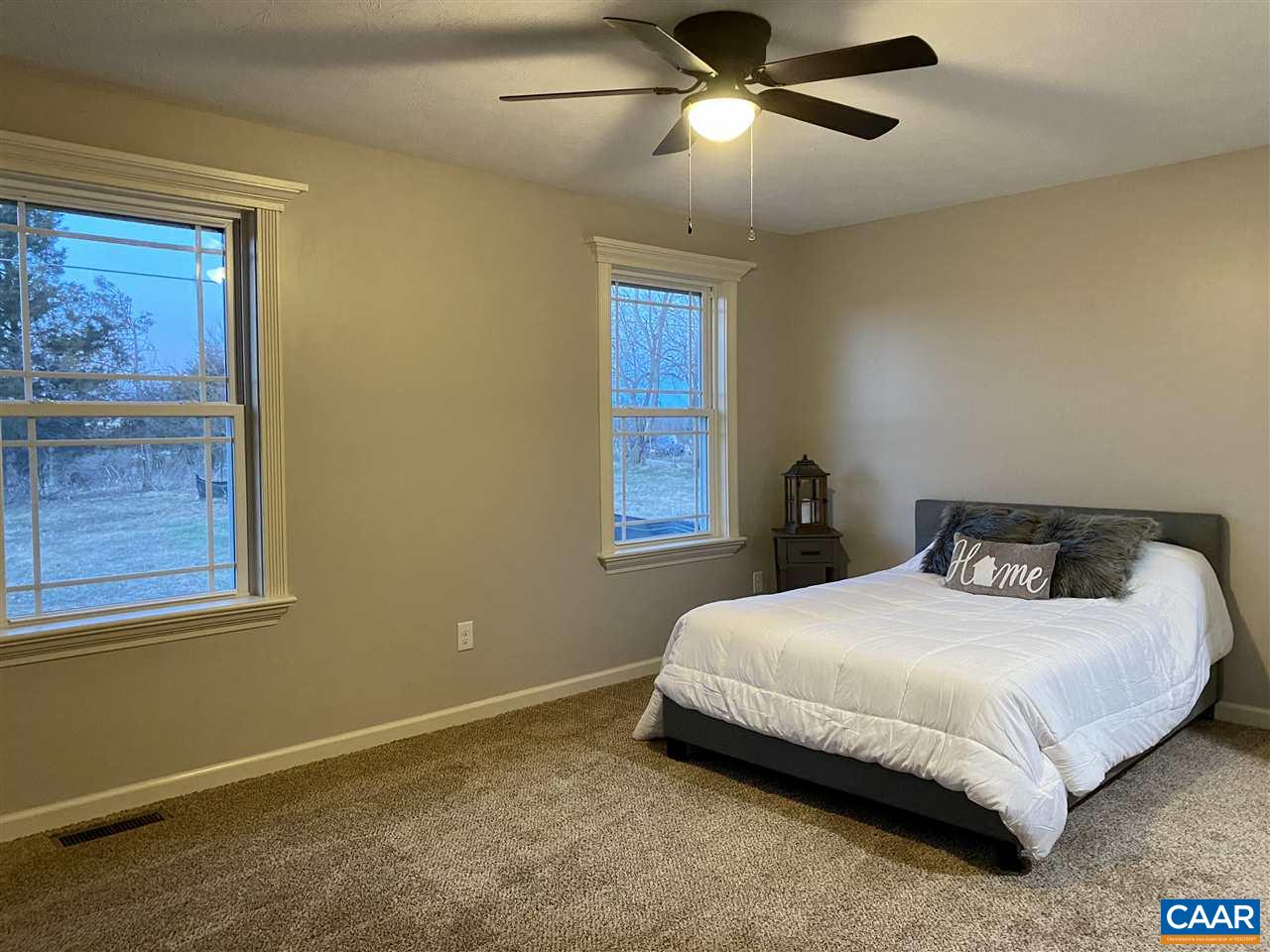 907 New Hope Road Staunton, VA 24401 - Photo 28 of 50 a bedroom with a bed and a window