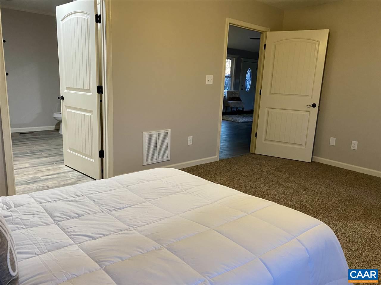 907 New Hope Road Staunton, VA 24401 - Photo 30 of 50 a bedroom with a bed and closet