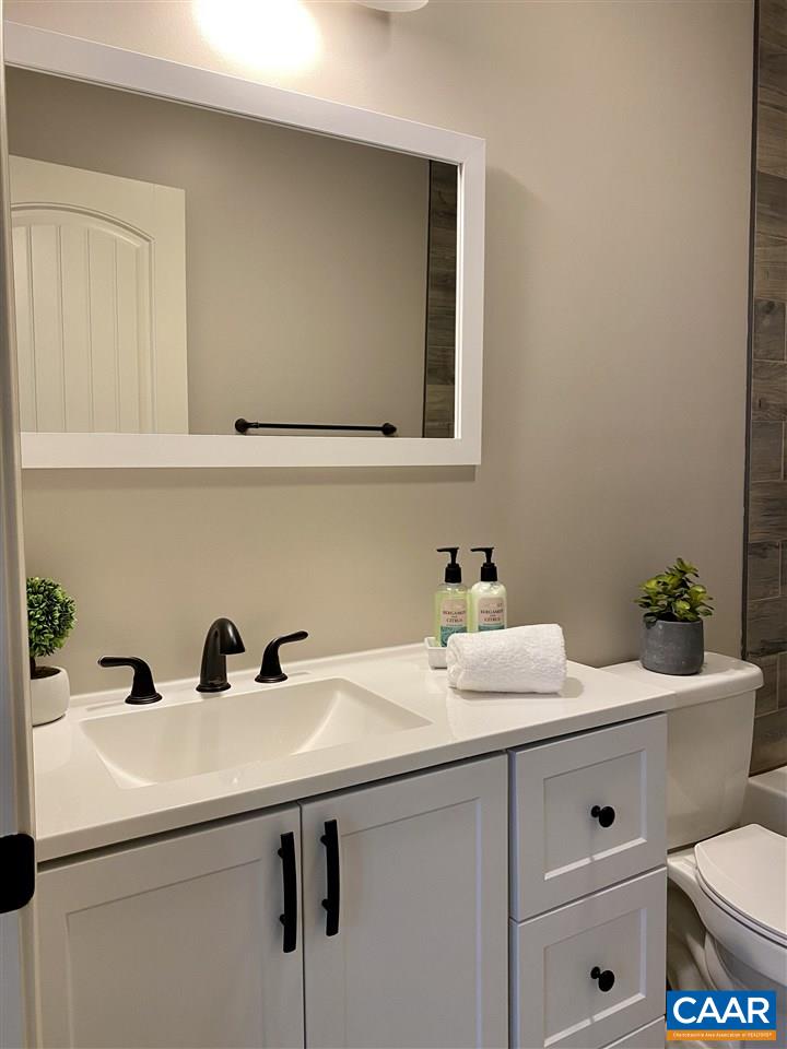 907 New Hope Road Staunton, VA 24401 - Photo 41 of 50 a bathroom with a sink and a toilet