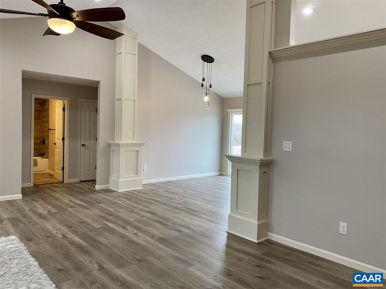 907 New Hope Road Staunton, VA 24401 - Photo 48 of 50 a view of empty room with wooden floor and fan