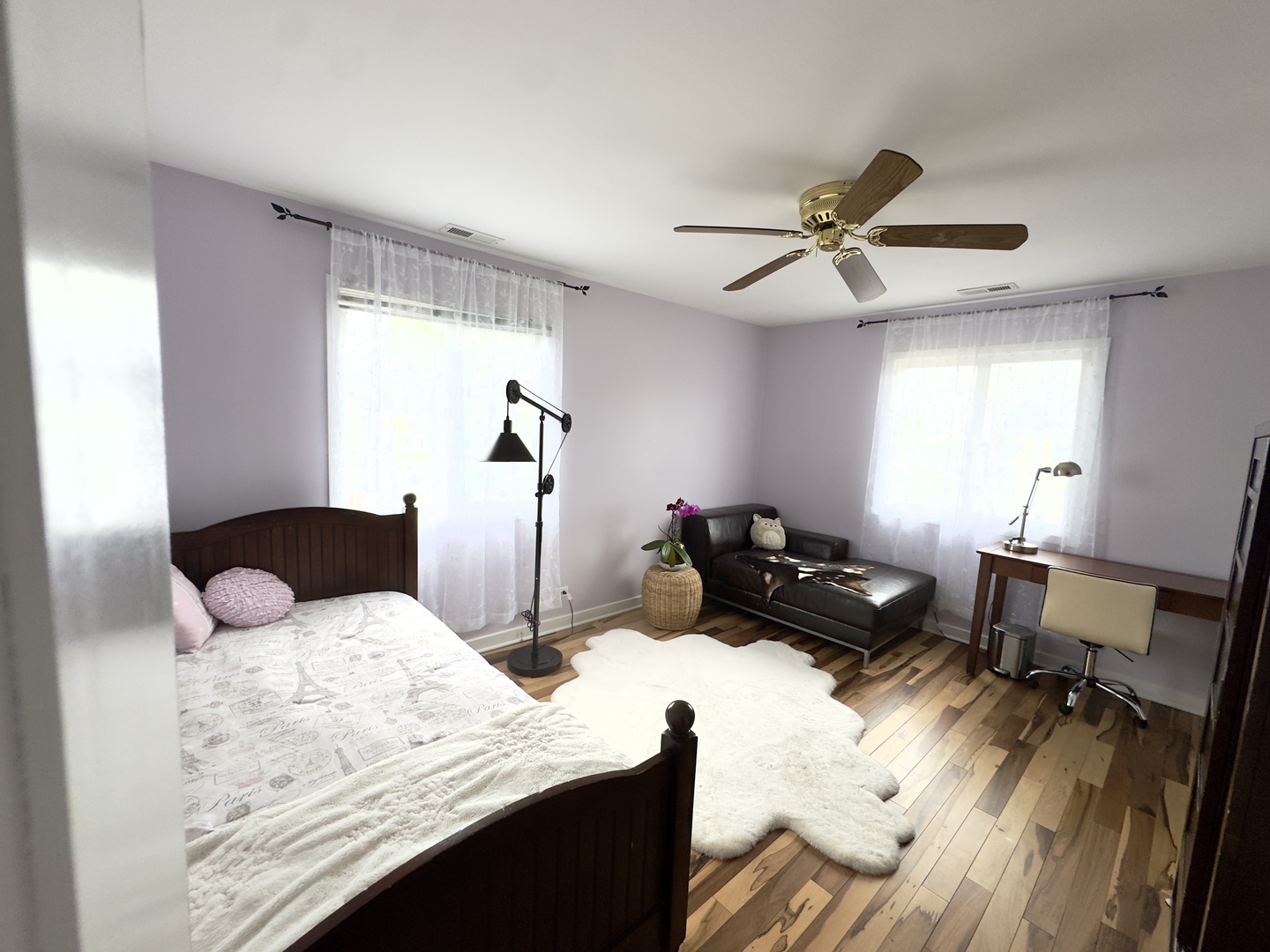 7210 Adams Street, Unit D Willowbrook, IL 60527 - Photo 14 of 19 a bedroom with a bed and wooden floor