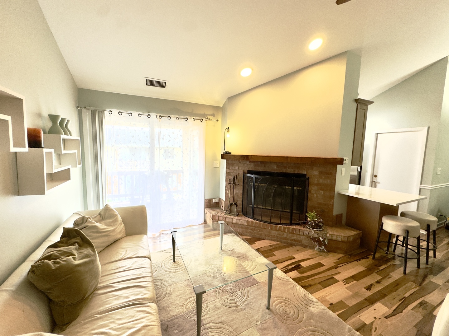 7210 Adams Street, Unit D Willowbrook, IL 60527 - Photo 3 of 19 a bedroom with a bed and a fireplace