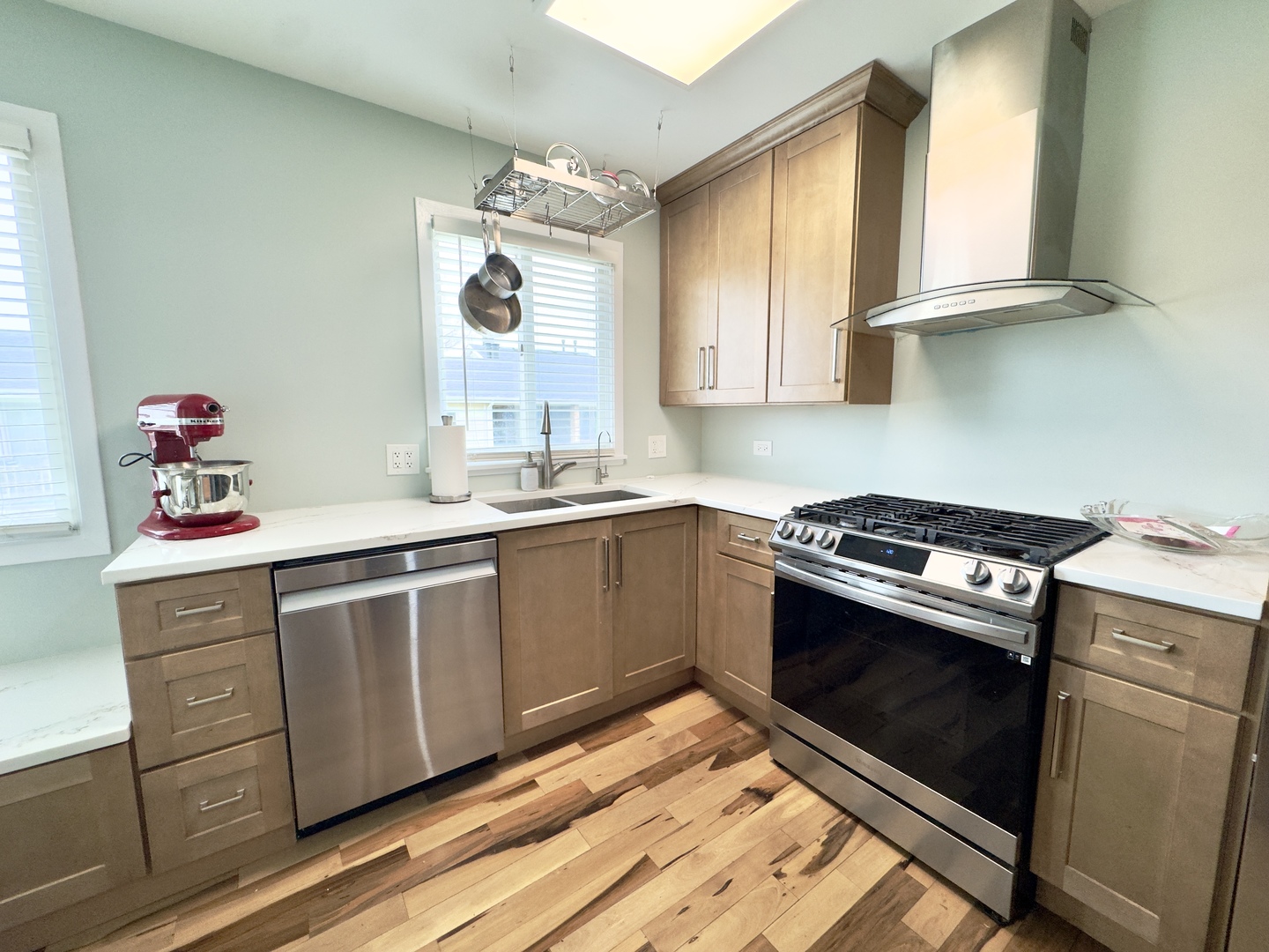 7210 Adams Street, Unit D Willowbrook, IL 60527 - Photo 7 of 19 a kitchen with sink cabinets and window