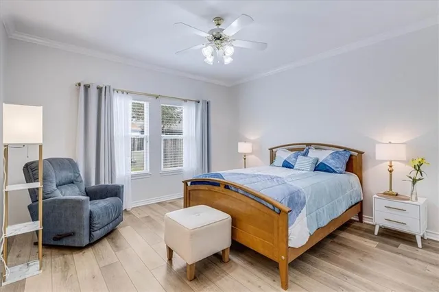 a bedroom with bed and a couch