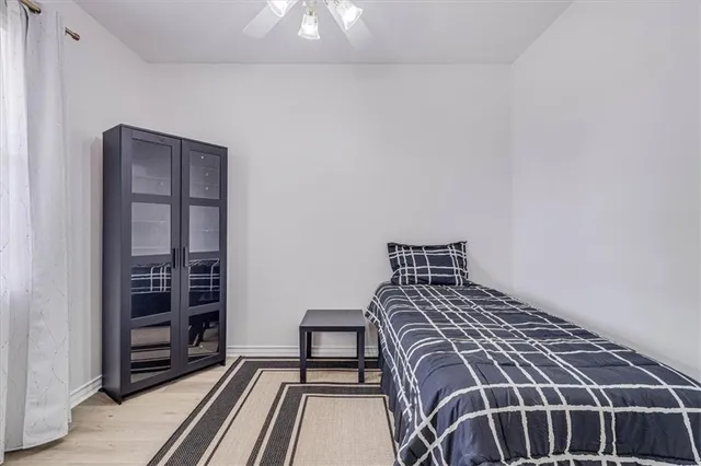 a view of a bedroom with closet