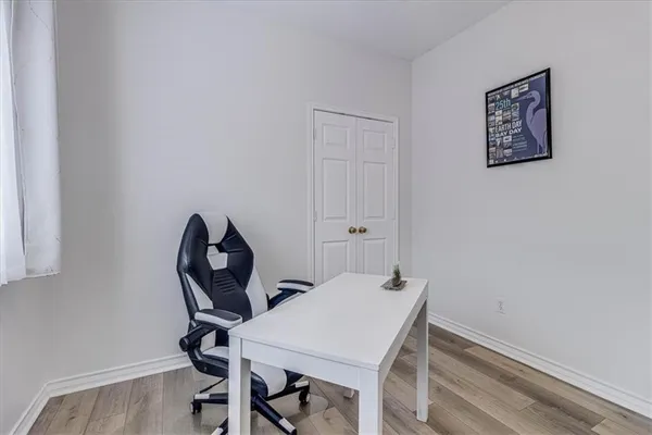 a view of a workspace with furniture