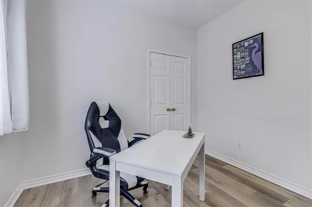 a view of a workspace with furniture