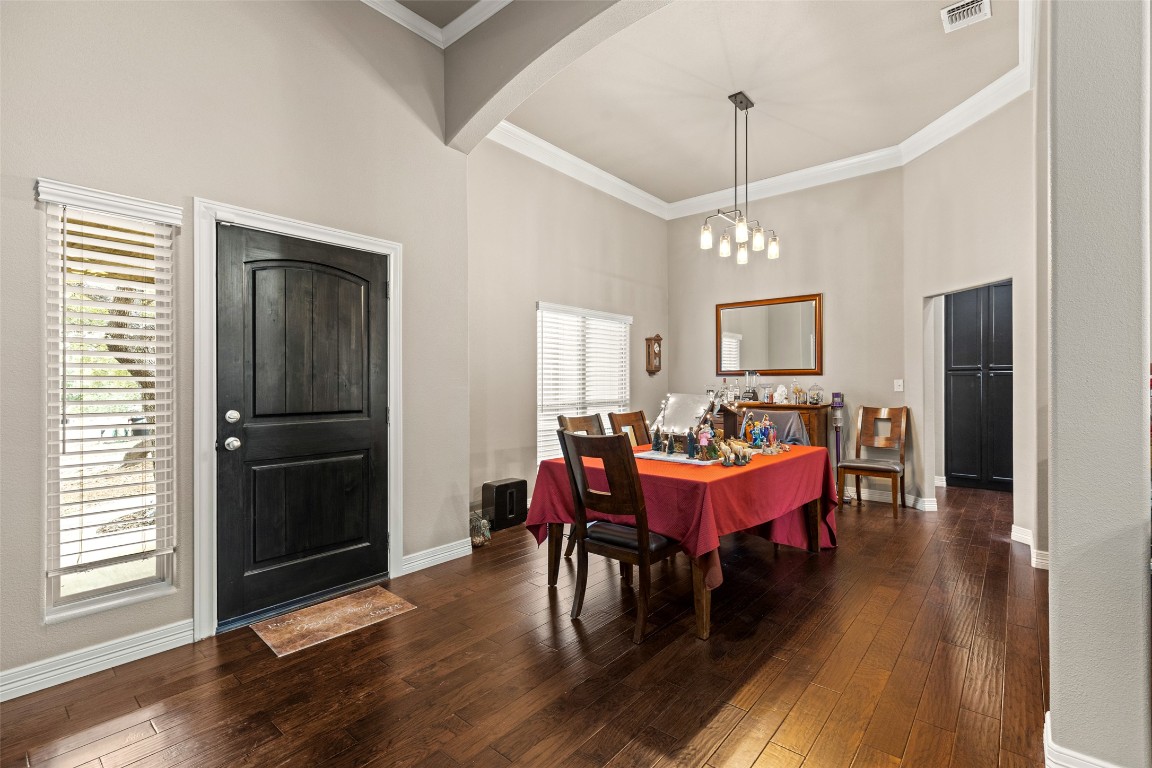 1291 Mossy Hollow Road Spring Branch, TX 78070 - Photo 4 of 23 a view of a dining room with furniture and window