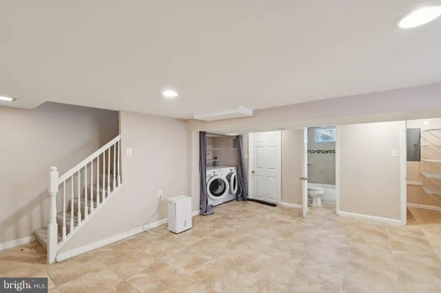 a view of a livingroom with a staircase