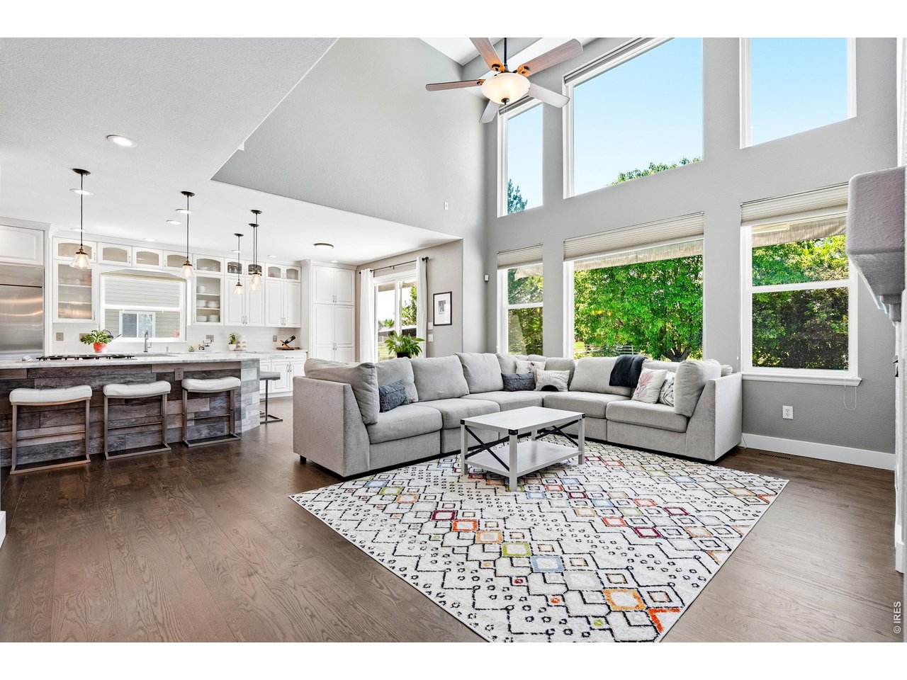 11725 Pleasant Hill Road Longmont, CO 80504 - Photo 7 of 50 The expansive living room, with soaring windows