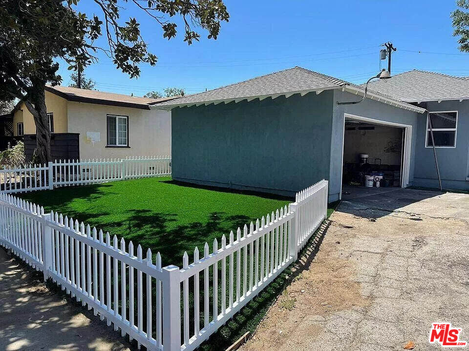 7669 Willis Avenue Van Nuys, CA 91405 - Photo 7 of 10 a view of a porch and garden