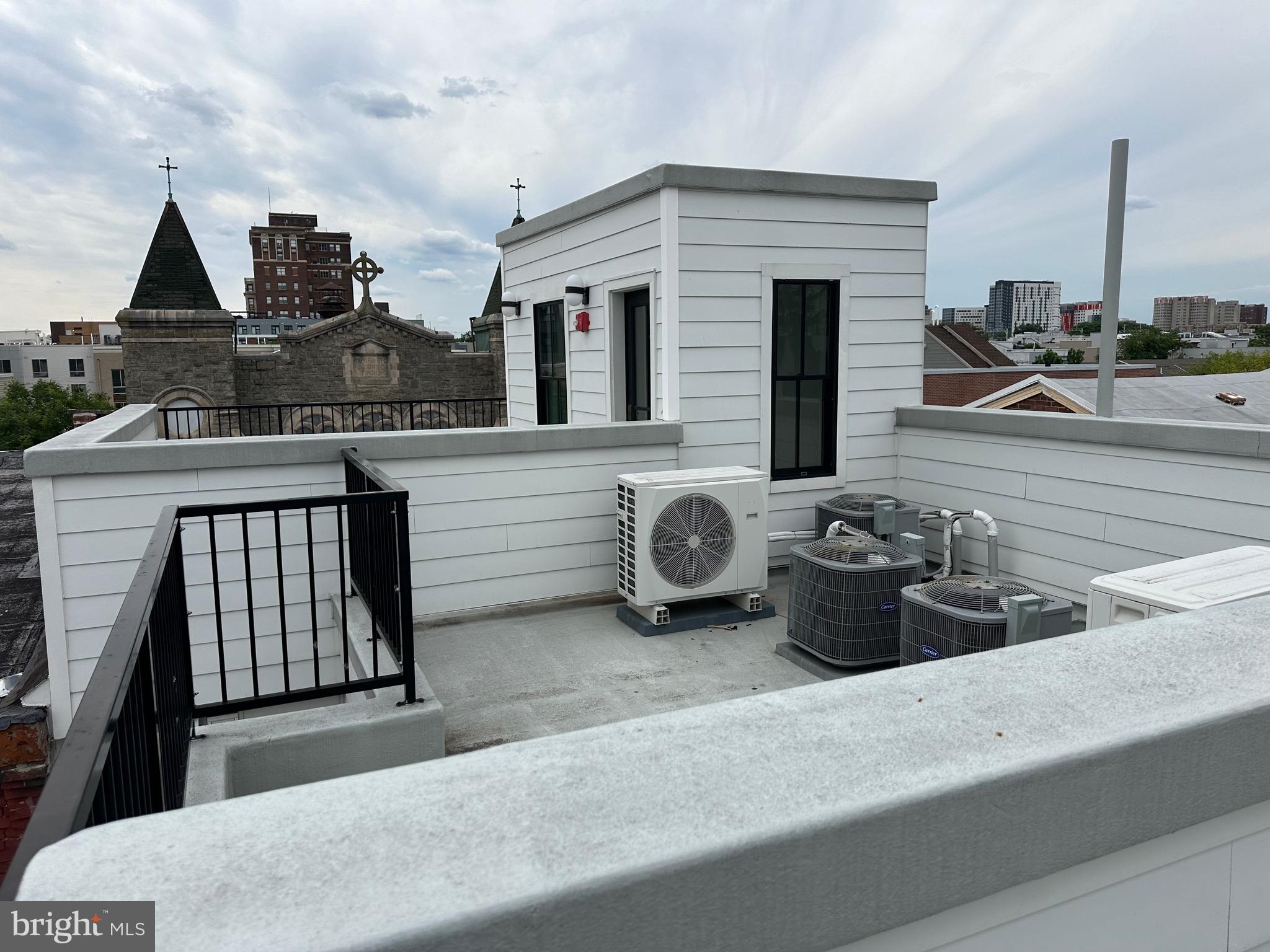 1227 North 6th Street Philadelphia, PA 19122 - Photo 28 of 32 a view of a patio with table and chairs