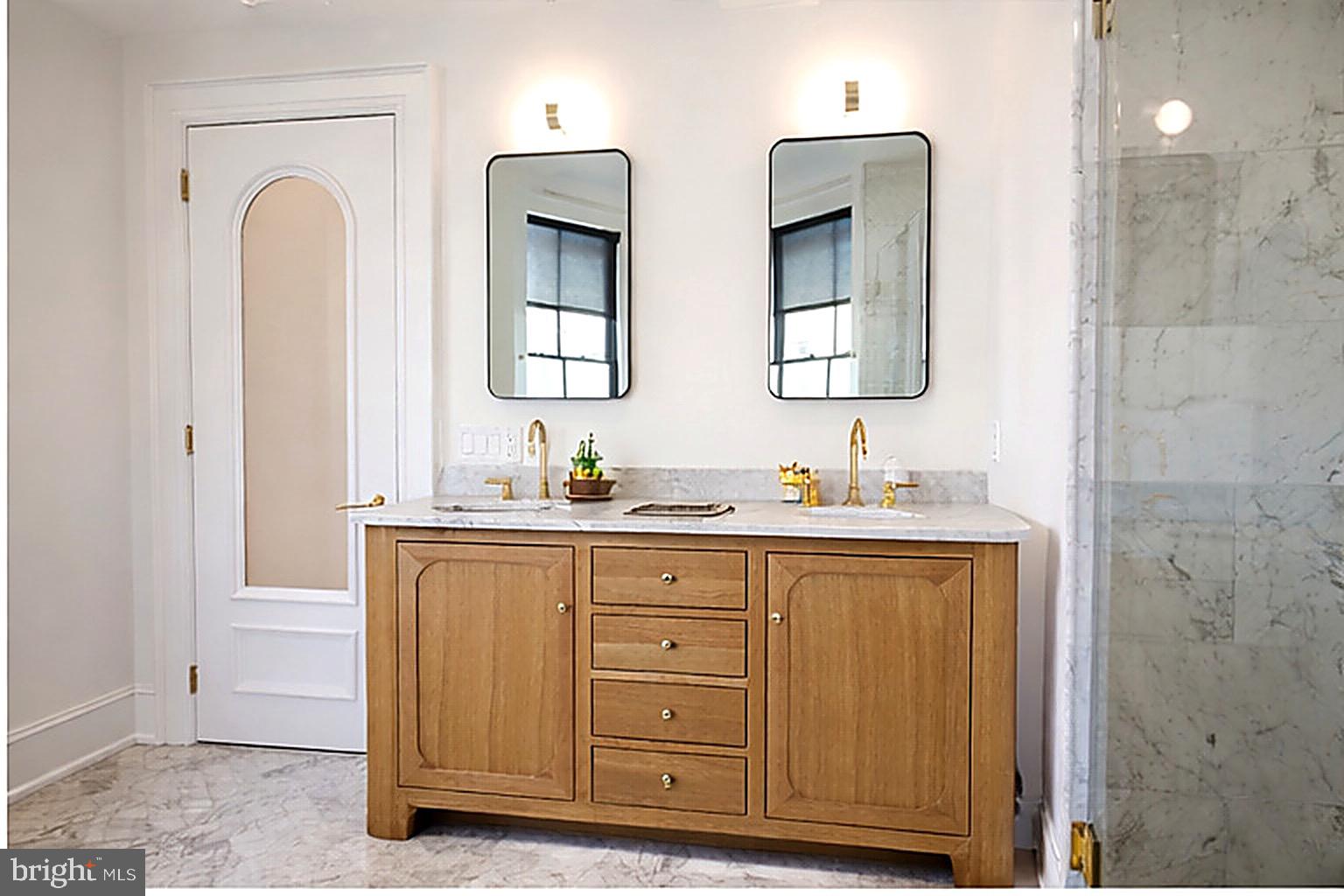 1227 North 6th Street Philadelphia, PA 19122 - Photo 4 of 32 a bathroom with a double vanity sink and a mirror