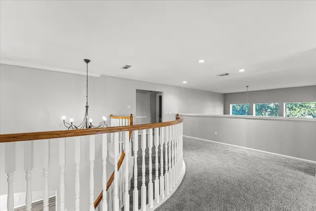 a view of hallway with stairs