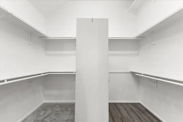 a view of an empty walk in closet