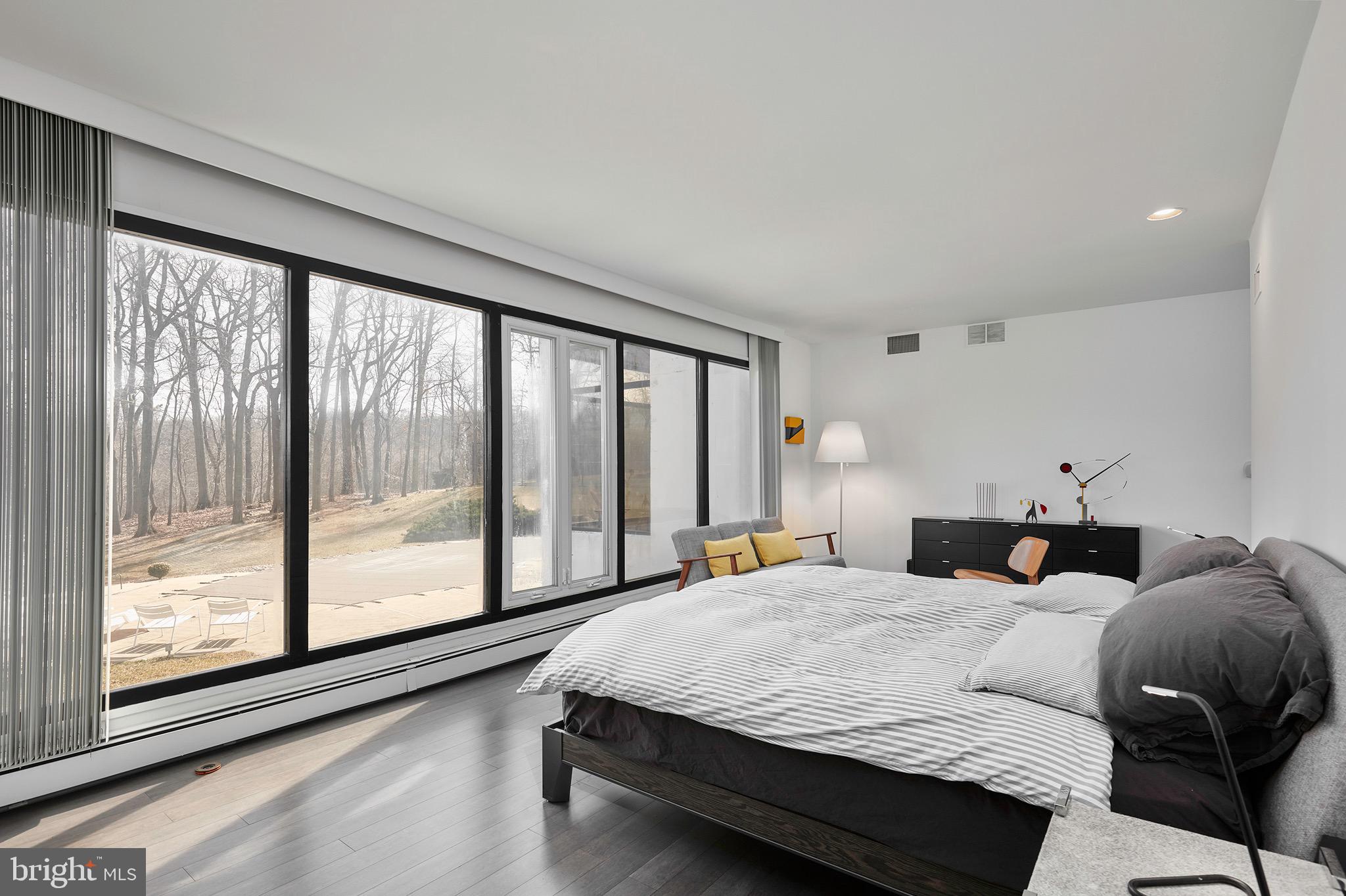 1371 Old Ford Road Huntingdon Valley, PA 19006 - Photo 23 of 37 a large bedroom with bed and glass window