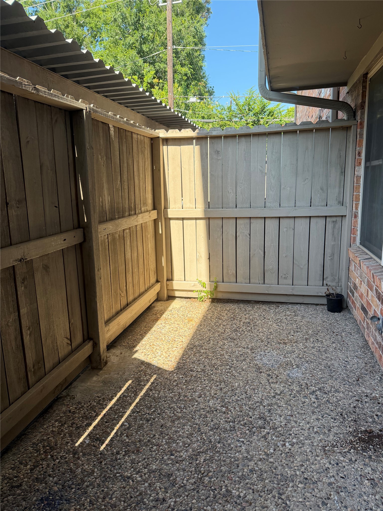 515 Tallowood Road, Unit 55 Houston, TX 77024 - Photo 16 of 18 a view of a backyard