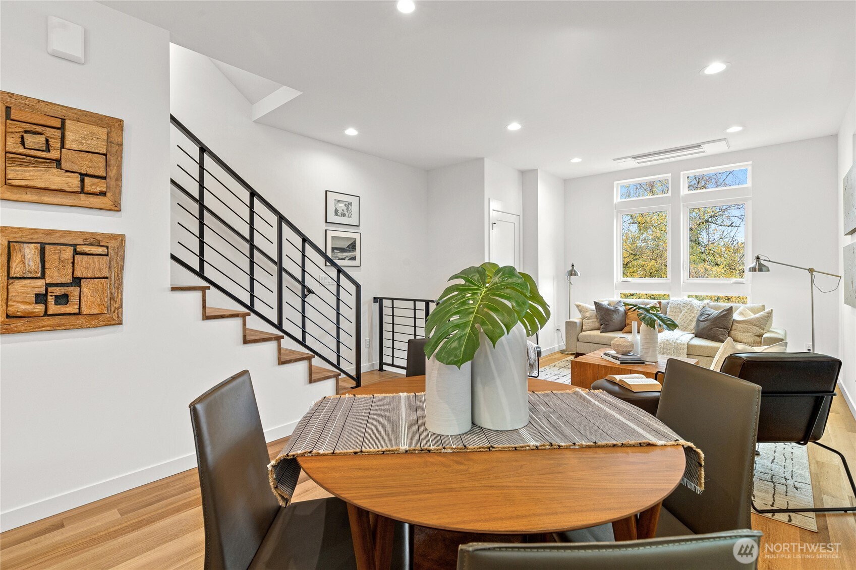 311 17th Avenue East Seattle, WA 98112 - Photo 16 of 39 a view of a dining room with furniture