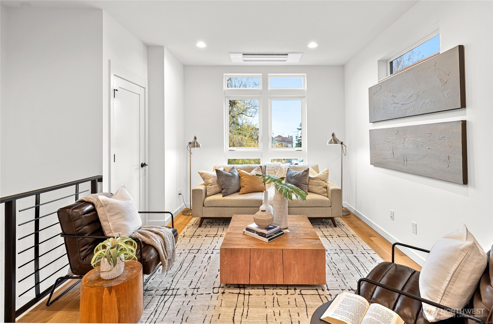 311 17th Avenue East Seattle, WA 98112 - Photo 18 of 39 a living room with furniture and a large window