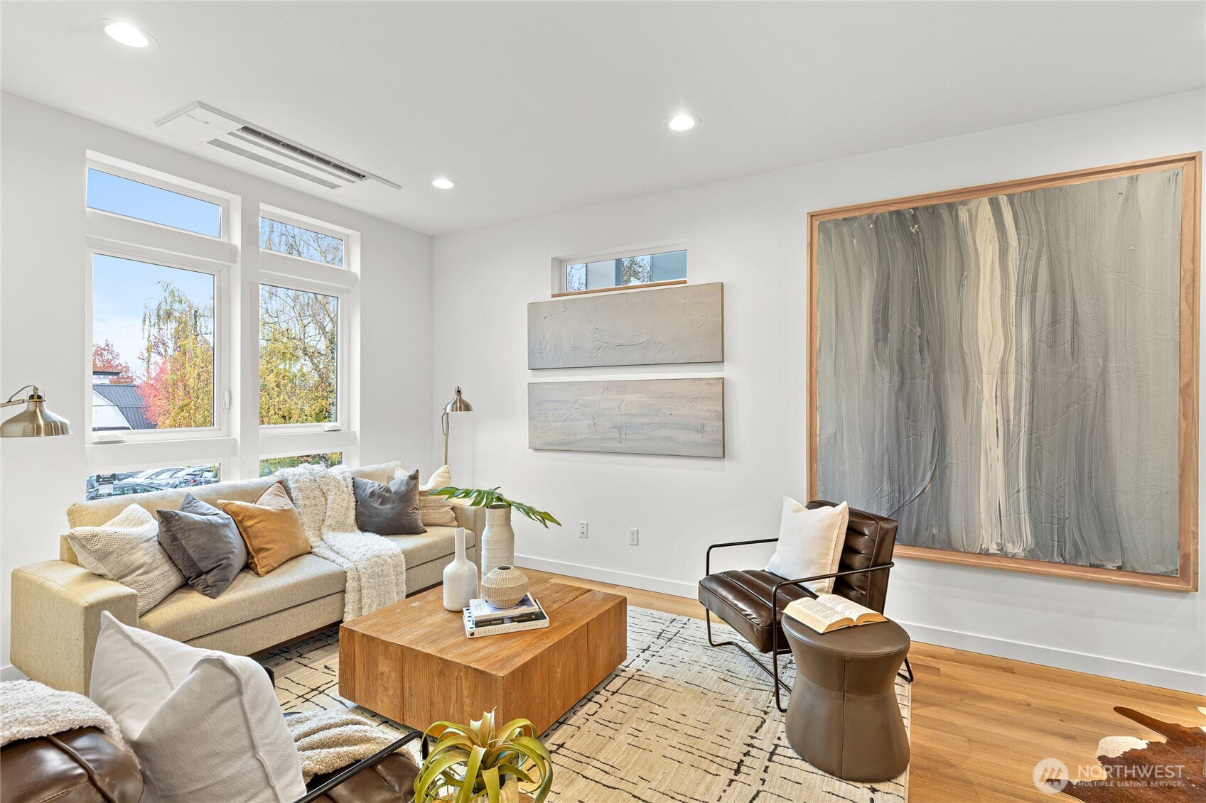 311 17th Avenue East Seattle, WA 98112 - Photo 19 of 39 a living room with furniture and a window