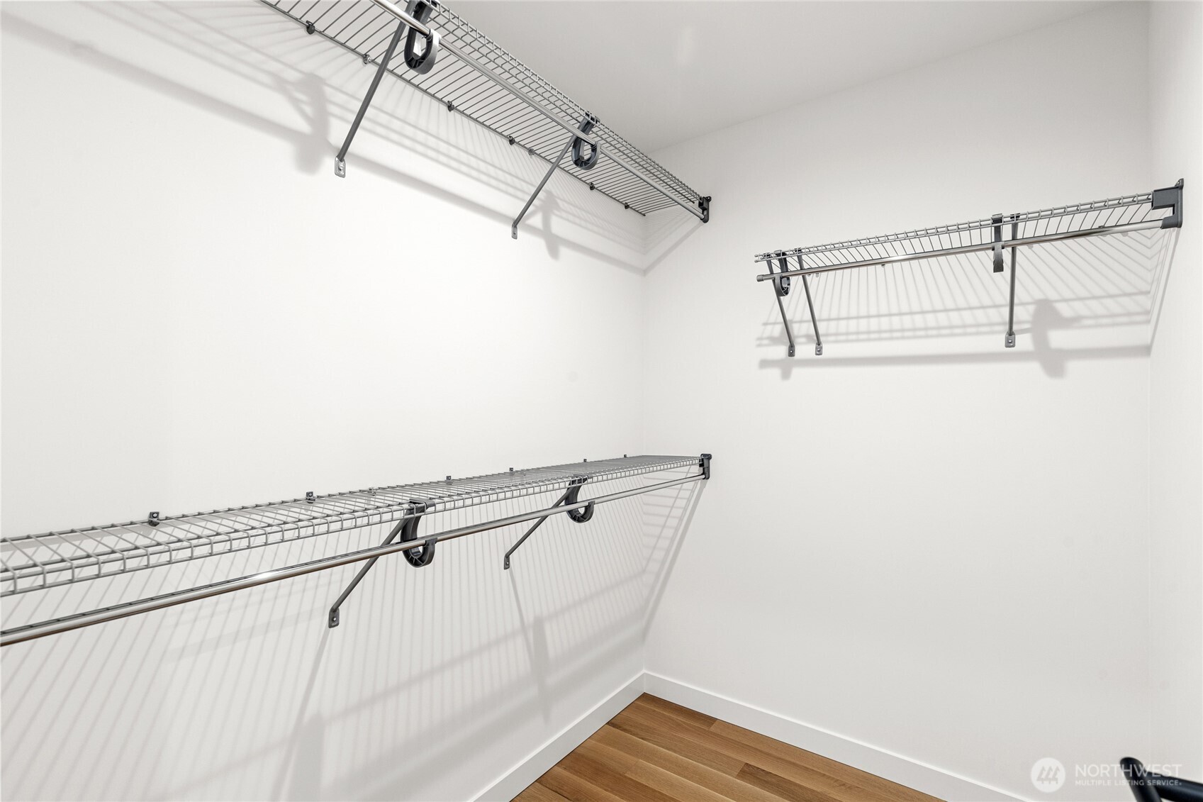 311 17th Avenue East Seattle, WA 98112 - Photo 29 of 39 a view of a room with racks on the wall