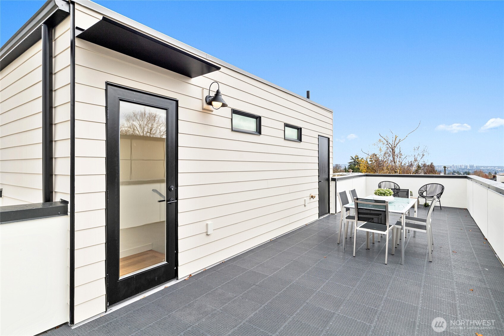 311 17th Avenue East Seattle, WA 98112 - Photo 31 of 39 a patio with table and chairs
